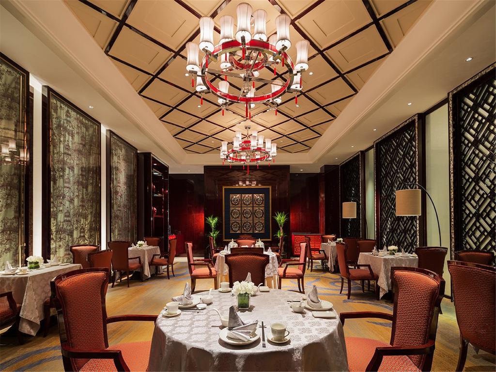 Готель Wanda Realm Fushun Fushun  Екстер'єр фото